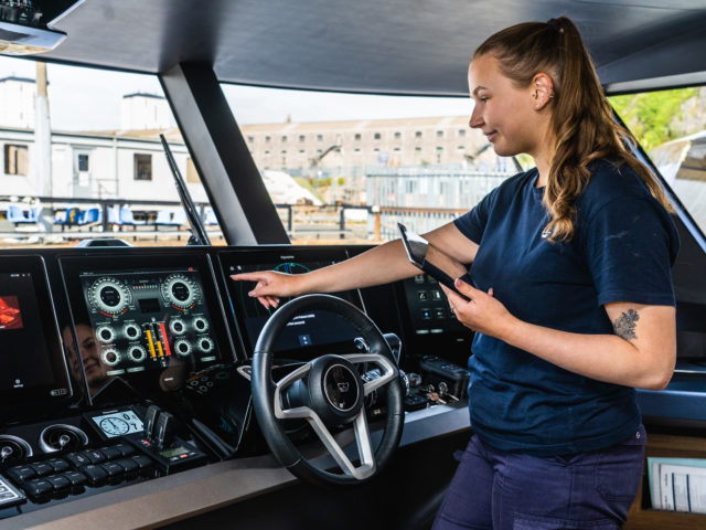 Female marine apprentice working on yacht at Princess Yachts